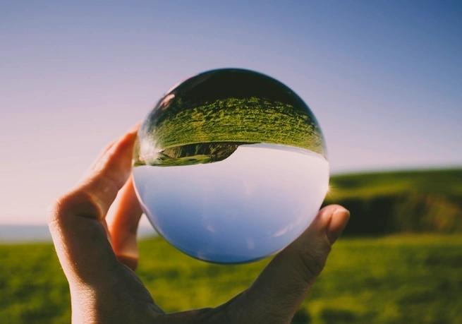 hill through glass orb help up to it