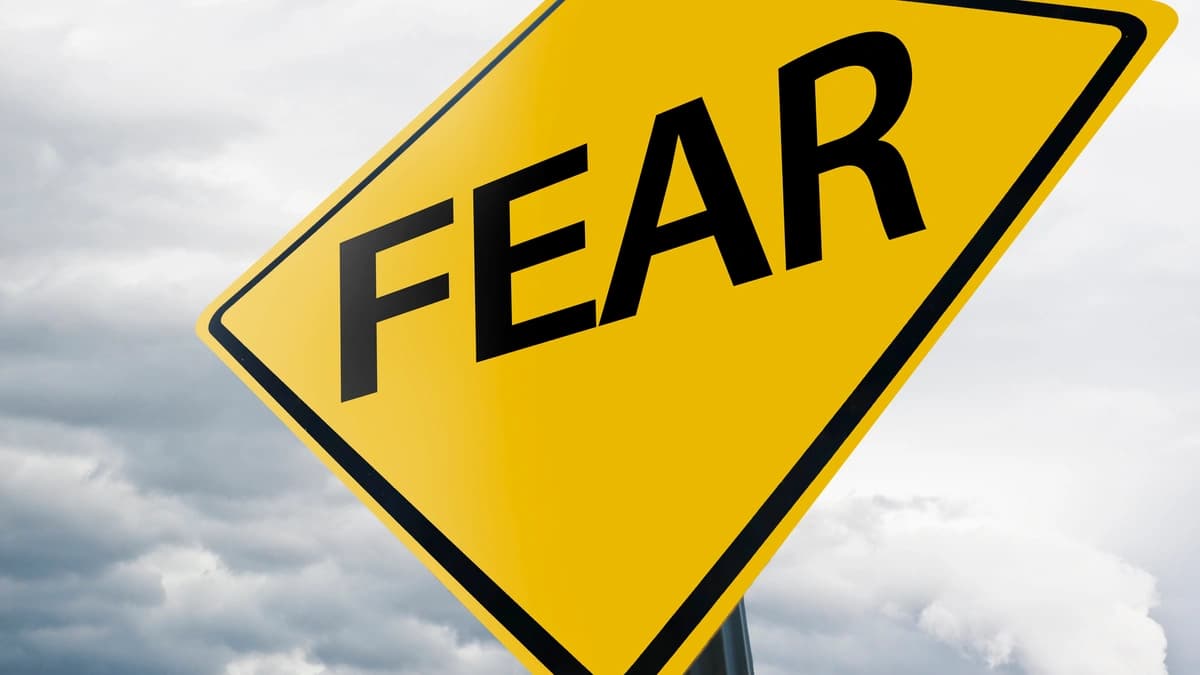 road sign that says "fear"